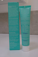 Back of the Flossy & Pure toothpaste carton and tube, showing the directions and product information